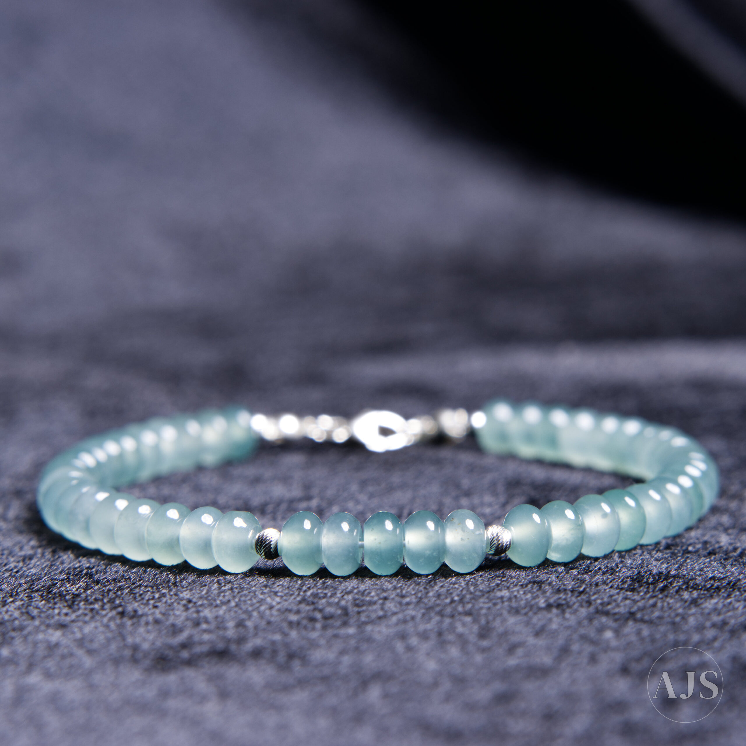 Type A Guatemalan jadeite bracelet with sea-green aqua rondelle beads and sterling silver accents