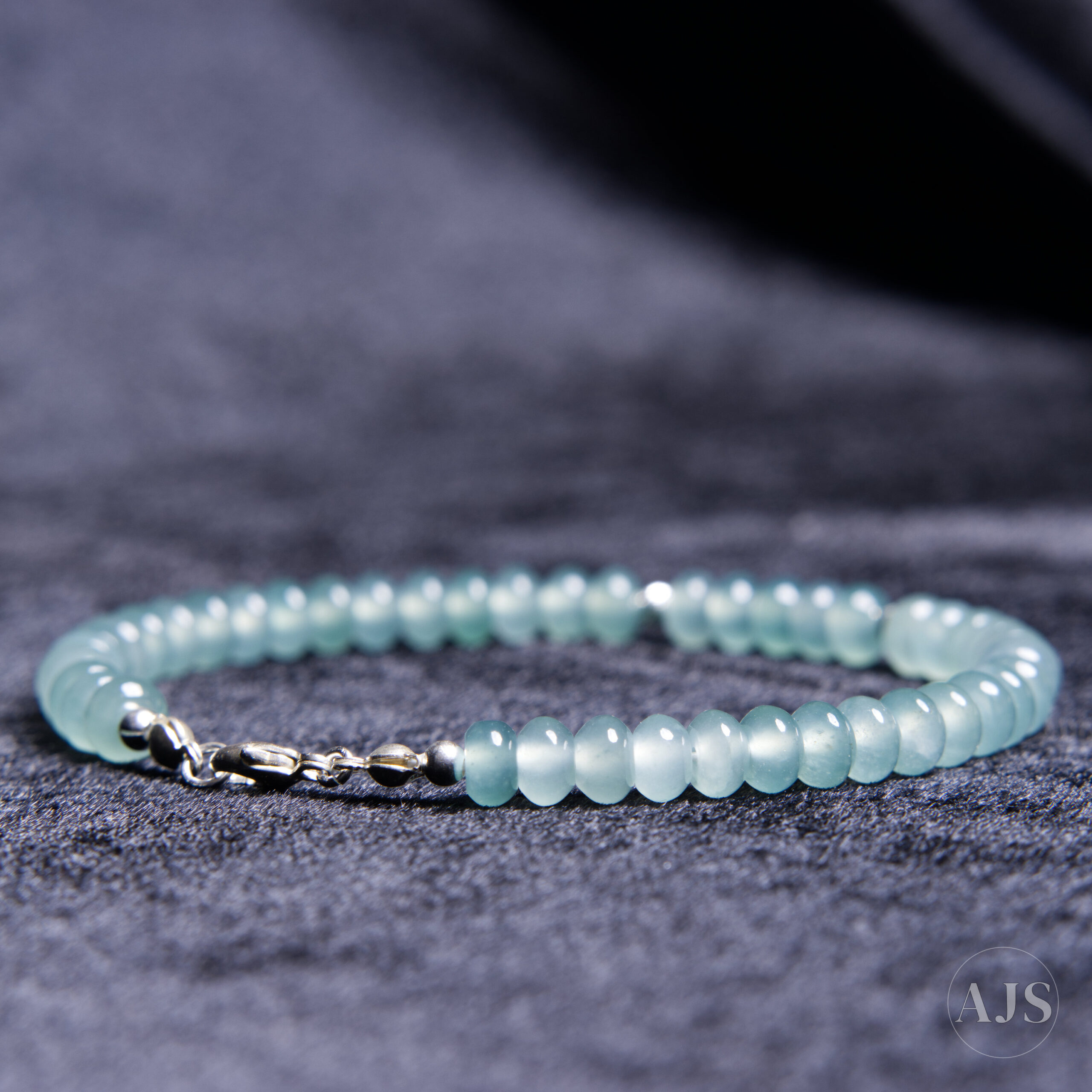 Guatemalan jadeite bracelet with sterling silver clasp and Beadalon wire construction